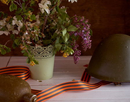 Black orange St. George ribbons on a wooden background. high quality photoの写真素材