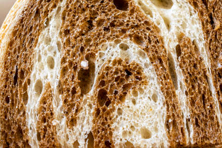 A close up view of a piece of marbled rye bread.の写真素材