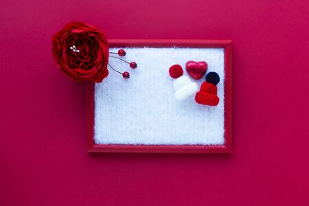 Red frame for Valentineâ€™s day with two cool little hats and chocolate candy with copy space....