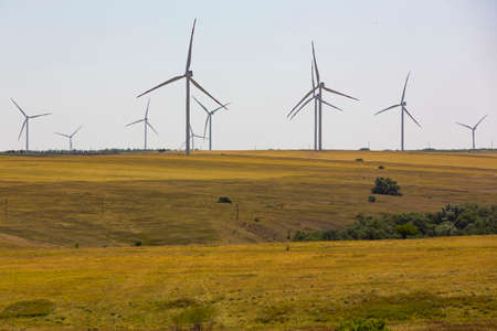 Windmill in a valley a source of clean energy from the wind.