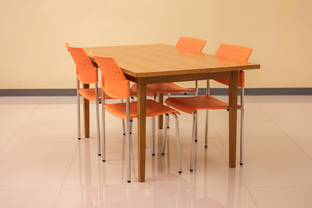 Meeting table and orange chairの写真素材