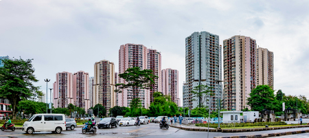 Row of apartement housing in Jakarta, Indonesia in front of trafficのeditorial素材