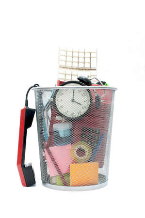 Bin Full of office supplies isolated on white background