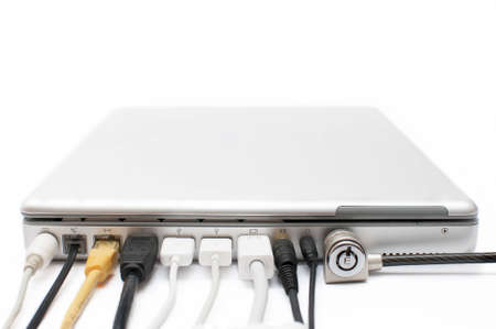Laptop with all kinds of connections isolated on white backgroundの写真素材
