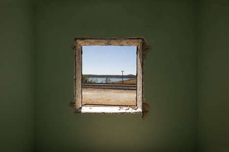 Abandoned room with scenery out the windowの写真素材