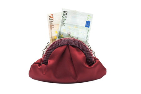  Bag with money bills isolated on white backgroundの写真素材