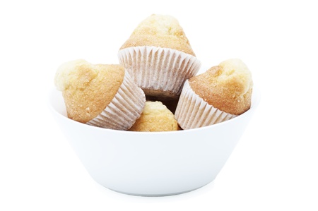 bowl with muffins isolated on white backgroundの写真素材