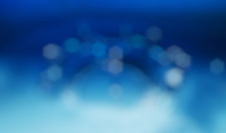 Ligths and bokeh on abstract blue background. の写真素材