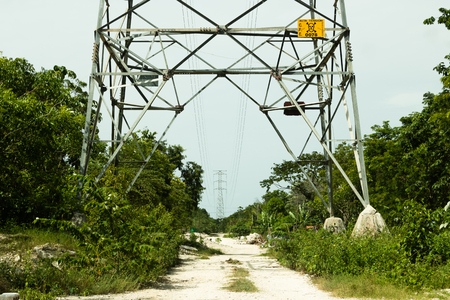 Power tower with high voltage to drive under, Playa del Carmen, Mexicoの写真素材