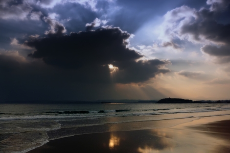 Cloudy sky over the Sardinero beach in Santander (Spain)の写真素材