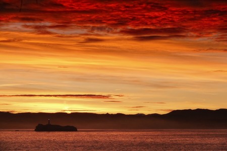The lighthouse of fire, Mouro Island, Santander (Spain)の写真素材