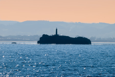 Panoramic view of The Mouro Island lighthouse in Santander (Cantabria, Spain)の写真素材