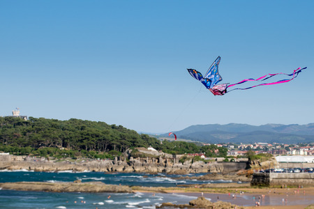 Detail of kite flying on the Sardinero beach in Santander (Cantabria)の写真素材