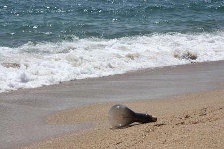 Lamp in a sunny beachの写真素材