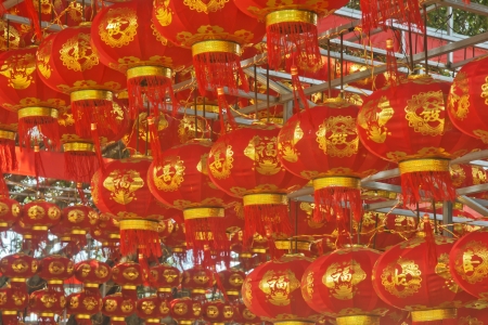 Chinese New Year red lanterns hanging high aboveの写真素材