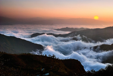 Mountain, clouds and  sunrise - The China Yuanyangtitian beautiful scenery.の写真素材