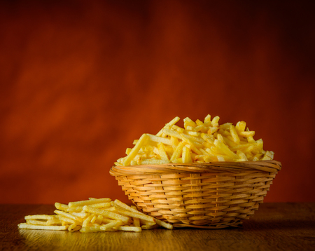 Potato sticks junk-food in still lifeの写真素材