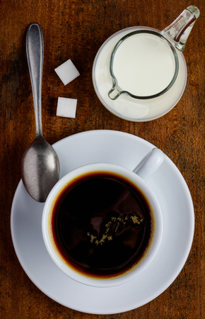 Top-down view of Coffee Cup, Milk and sugarの写真素材