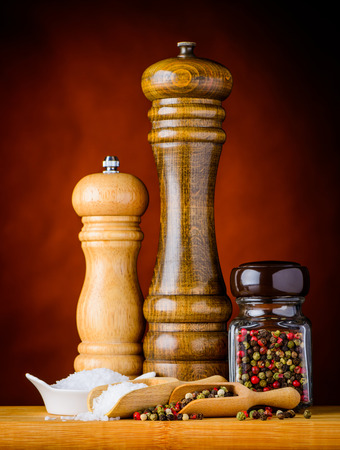 Salt and Peppercorn with salt mill grinder and Pepper mill grinderの写真素材