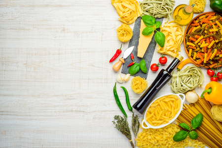 Italian Cuisine Food and cooking ingredients with copy space. Pasta and cheese with Spices and Seasoningの写真素材