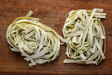 Green Tagliatelle tagliolini fettucine Pasta. Itallian or mediterranean cuisine foodの写真素材
