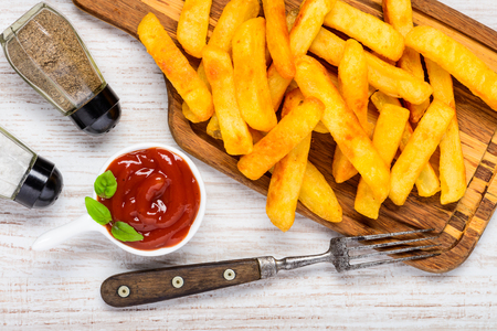 French Fried Potatoes with Ketchup and Condimentsの写真素材