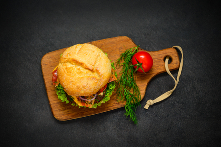 Top View of Burger Sandwich with Meat, bacon and Vegetablesの写真素材