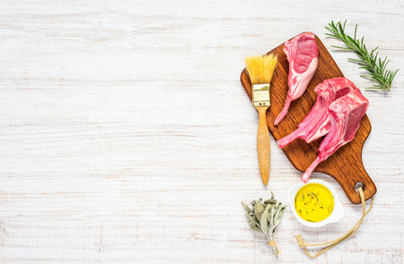 Copy Space Text Area and Raw Lamb Chops with Seasonings and Congiments in Top Viewの写真素材