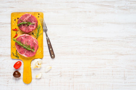 Copy Space Text Area with Raw Meat and Condiments in Top Viewの写真素材