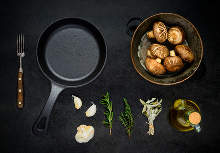 Top view of Mushrooms, Cooking Ingredients and Iron Frying Panの写真素材
