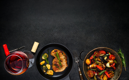 Copy Space with Steak, Rose Wine and Grilled Vegetablesの写真素材