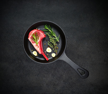 Top View of Raw Lamb Meat Chops with Cooking Ingredientsの写真素材