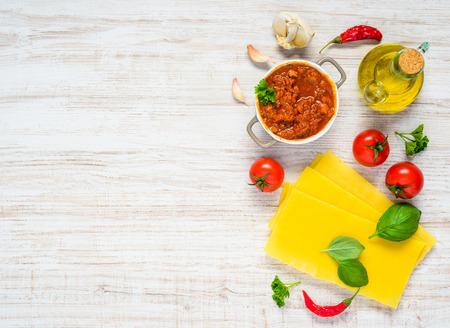 Top View of Italian Food Cooking Ingredients with Lasagna Pasta and Copy Space Text Areaの写真素材