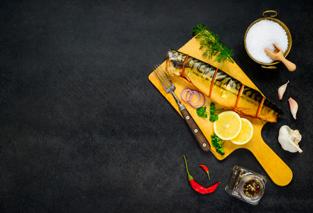 Smoked Mackerel Fish with Cooking Ingredients and Condimentsの写真素材