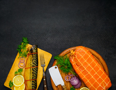 Top View of Smoked Mackerel and Salmon Fish on Copy Space Text Areaの写真素材