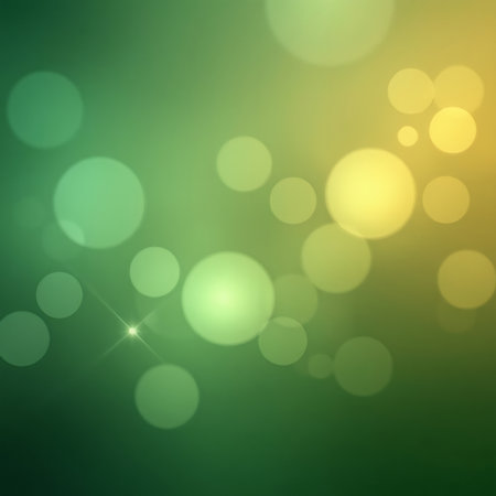 Soft green to gold gradient background with glowing bokeh circles and a subtle star flare.の素材