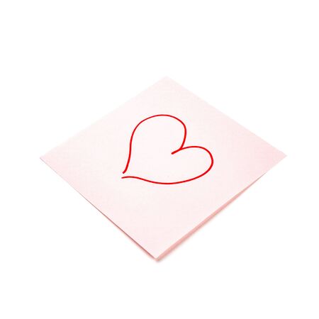 Paper sticker. Stylized image of the heart symbol. Isolated sticker with shadow on a white background. Sticky note. A piece of paper for notes. Self-adhesive piece of paper.の写真素材