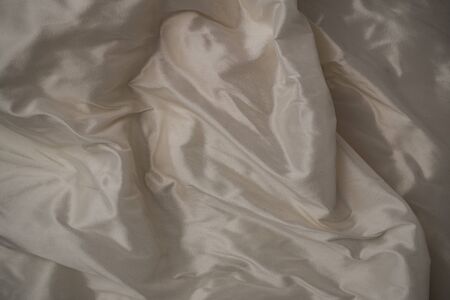 Background image of crumpled pink fabricの写真素材