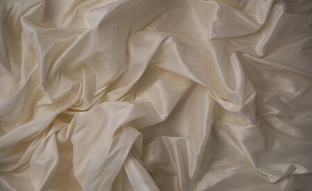 Background image of crumpled pink fabricの写真素材