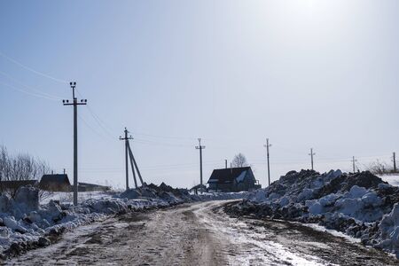Russian village in winter. Siberian snowy countryside.の写真素材