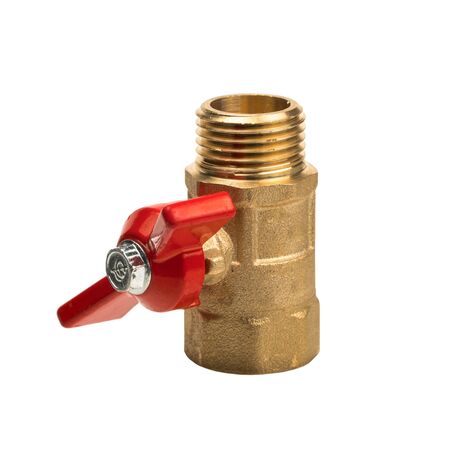 Isolated object on a white background. Water tap with a red valve. Part of the water supply system. Valve used in plumbing. A device in which when turning the flywheel, the fluid passageway is blockedの写真素材
