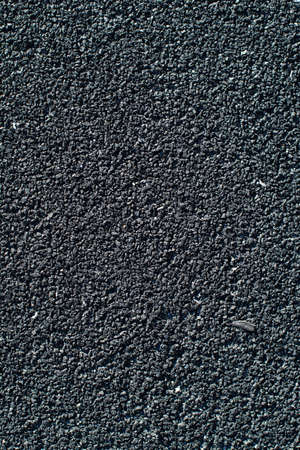 Uniform texture of asphalt pavement close upの写真素材