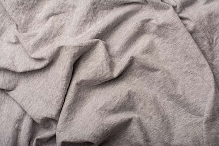 Detailed image of crumpled fabric. Image for the background. soft shadows. Close-up shot of fabric texture.の写真素材