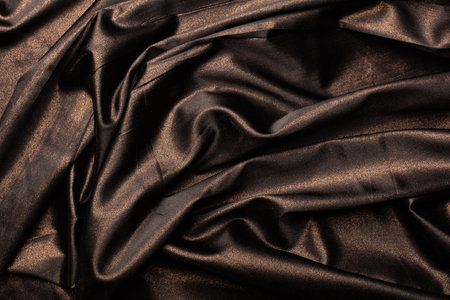 Detailed image of crumpled fabric. Image for the background. soft shadows. Close-up shot of fabric texture.の写真素材