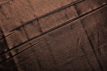 Detailed image of crumpled fabric. Image for the background. soft shadows. Close-up shot of fabric texture.の写真素材