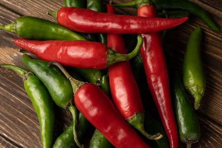 Chili pepper lies on an oak boardの写真素材