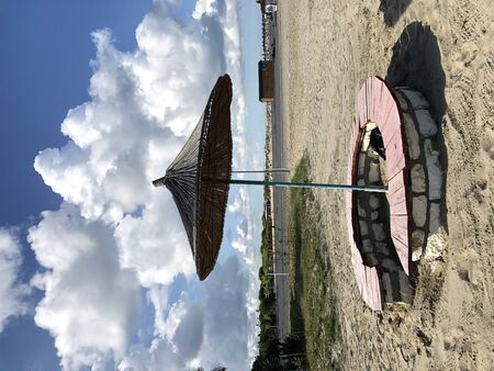 One beach umbrella on the beautiful beach in Durre,Albania.blue skyの写真素材