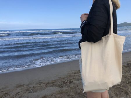 Female holding eco bag,no plastic,save the earth concept.copy spaceの写真素材