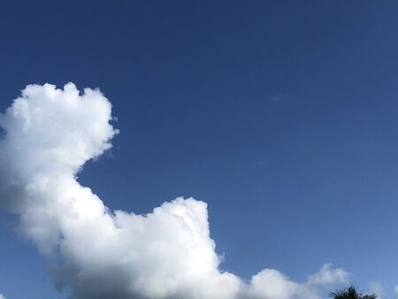 Beautiful blue sky with white clouds. Background concept. Copy spaceの写真素材