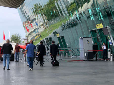 Flight attendants ,walking with her luggage, back viewのeditorial素材